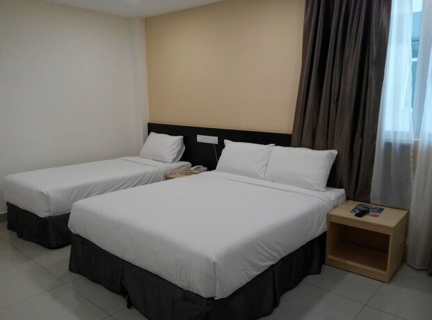 Imagen de la habitación del Hotel Avenue Bangi Hotel. Foto 14
