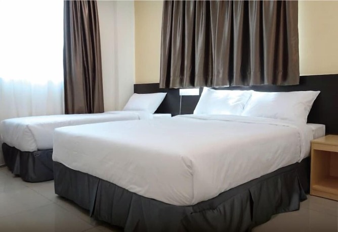 Imagen de la habitación del Hotel Avenue Bangi Hotel. Foto 15