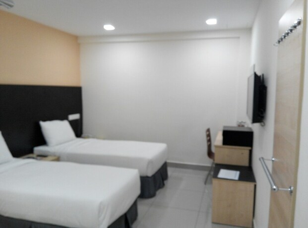 Imagen de la habitación del Hotel Avenue Bangi Hotel. Foto 16