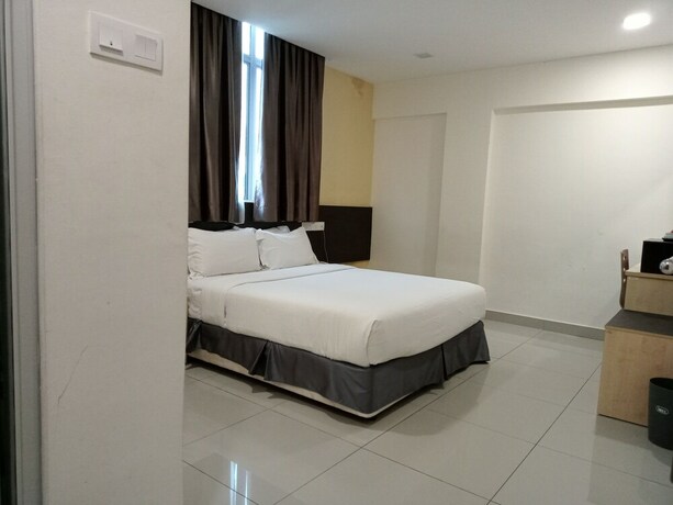 Imagen de la habitación del Hotel Avenue Bangi Hotel. Foto 18
