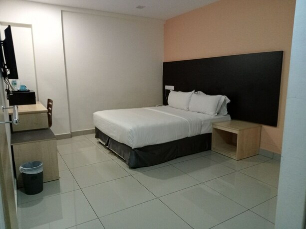 Imagen de la habitación del Hotel Avenue Bangi Hotel. Foto 19