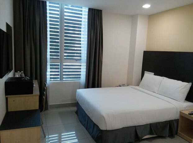 Imagen de la habitación del Hotel Avenue Bangi Hotel. Foto 20