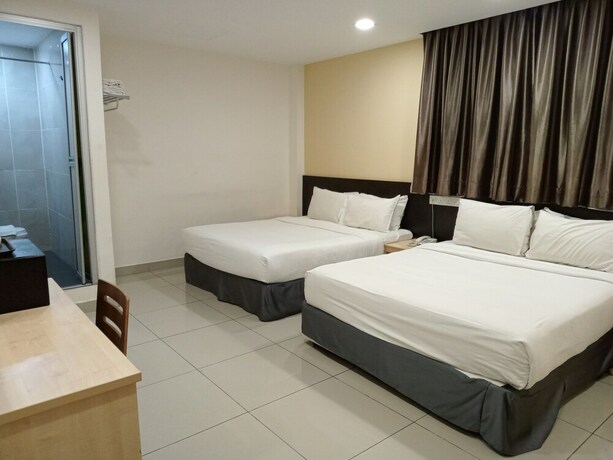 Imagen de la habitación del Hotel Avenue Bangi Hotel. Foto 21