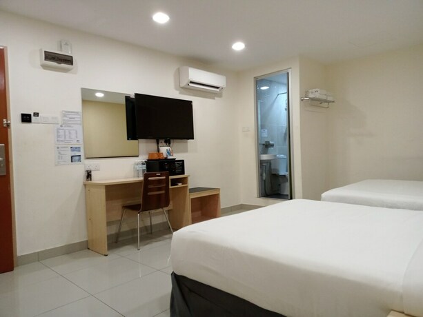 Imagen de la habitación del Hotel Avenue Bangi Hotel. Foto 22