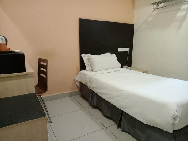 Imagen de la habitación del Hotel Avenue Bangi Hotel. Foto 23