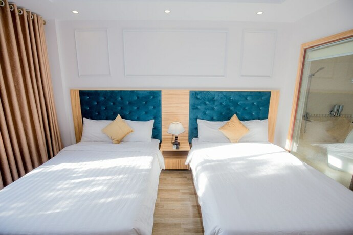 Imagen de la habitación del Hotel Avenue Hotel Sam Son. Foto 21