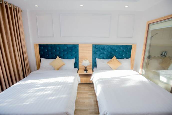 Imagen de la habitación del Hotel Avenue Hotel Sam Son. Foto 22