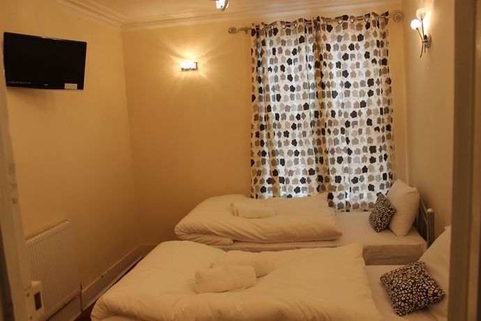 Imagen de la habitación del Hotel Avenue Inn. Foto 10