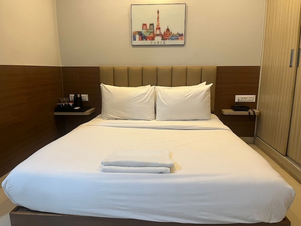 Imagen de la habitación del Hotel Avenue Suites. Foto 5