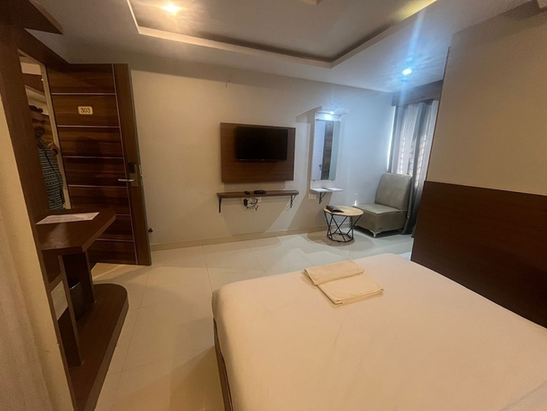 Imagen de la habitación del Hotel Avenue Suites. Foto 6