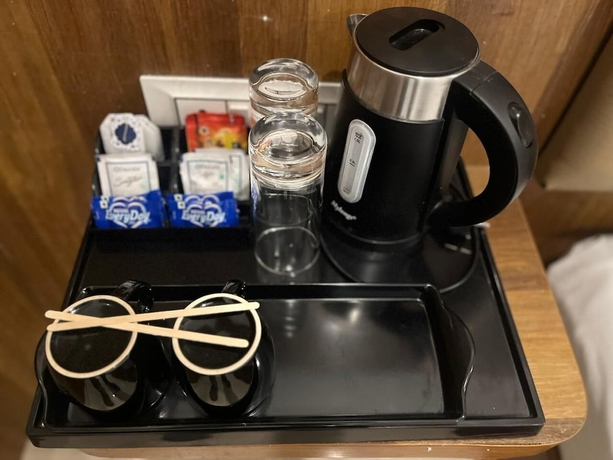Imagen de la habitación del Hotel Avenue Suites. Foto 8