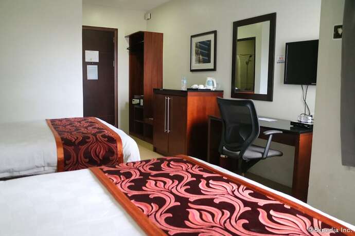Imagen de la habitación del Hotel Avenue Suites Hotel. Foto 13