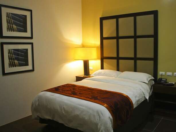Imagen de la habitación del Hotel Avenue Suites Hotel. Foto 15