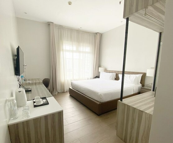 Imagen de la habitación del Hotel Avenue Suites Hotel. Foto 16