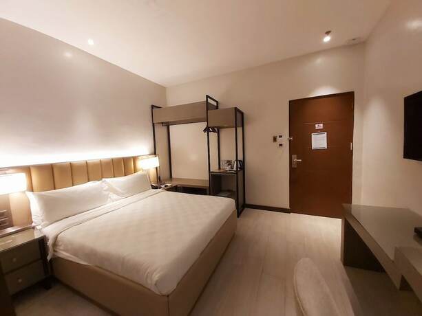 Imagen de la habitación del Hotel Avenue Suites Hotel. Foto 19