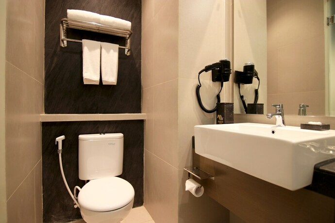 Imagen de la habitación del Hotel Aveon Hotel Yogyakarta. Foto 9