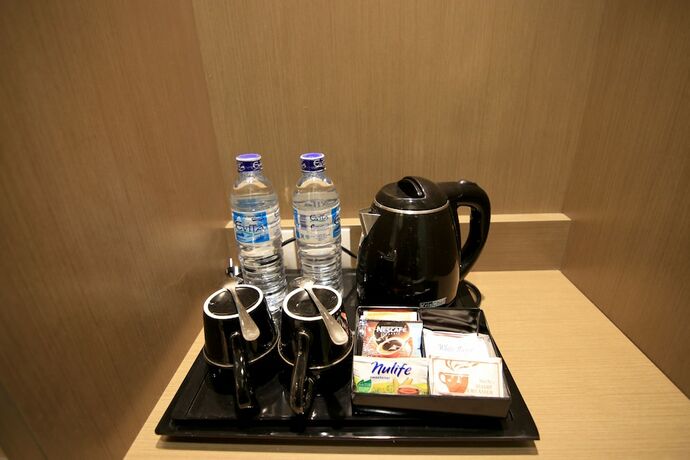 Imagen de la habitación del Hotel Aveon Hotel Yogyakarta. Foto 10