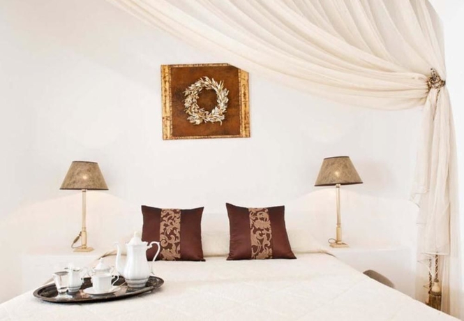 Imagen de la habitación del Hotel Avianto Suites. Foto 6