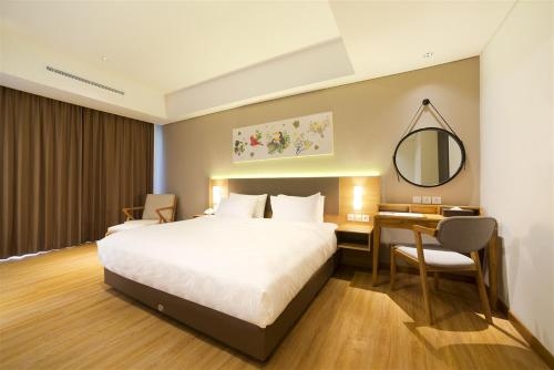 Imagen de la habitación del Hotel Aviary Bintaro. Foto 9
