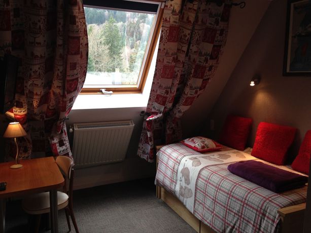 Imagen de la habitación del Hotel Aviation, La Bourboule. Foto 16