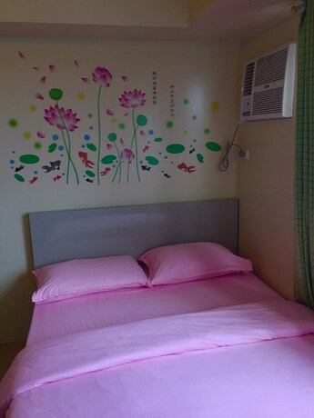 Imagen de la habitación del Hotel Avida Towers Condotel. Foto 25