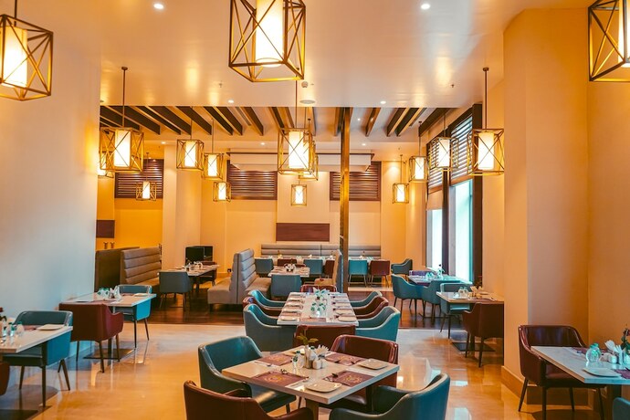 Imagen del bar/restaurante del Hotel Avinash International. Foto 12