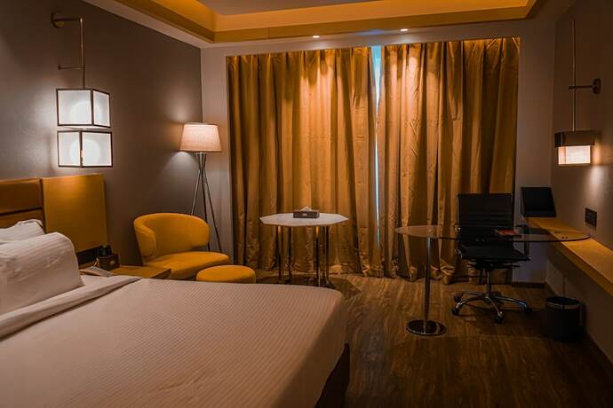 Imagen de la habitación del Hotel Avinash International. Foto 14