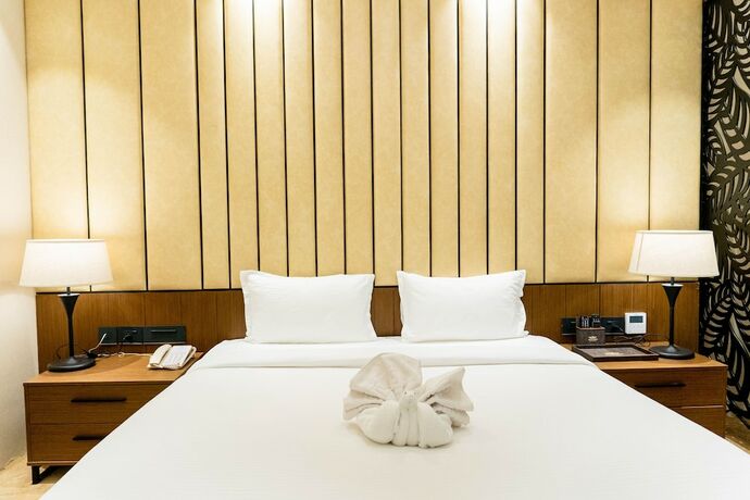 Imagen de la habitación del Hotel Avinash International. Foto 15