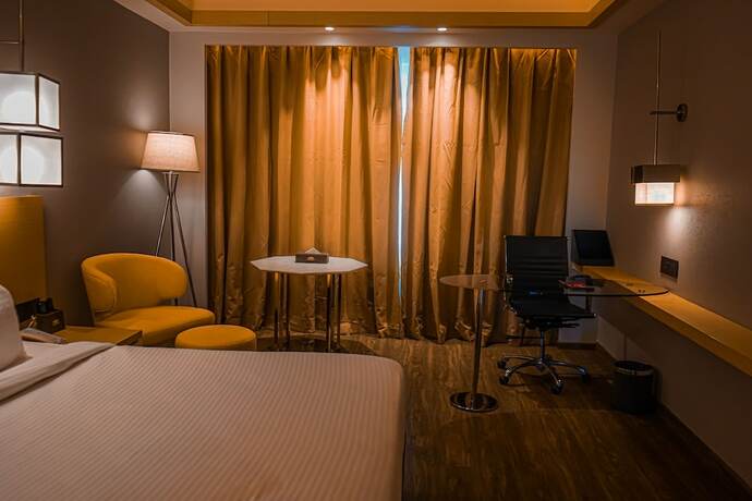 Imagen de la habitación del Hotel Avinash International. Foto 17