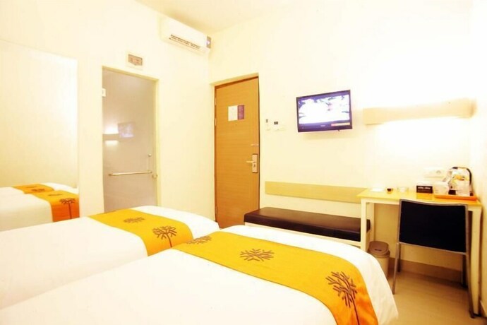 Imagen de la habitación del Hotel Avirahotel Panakkukang. Foto 4