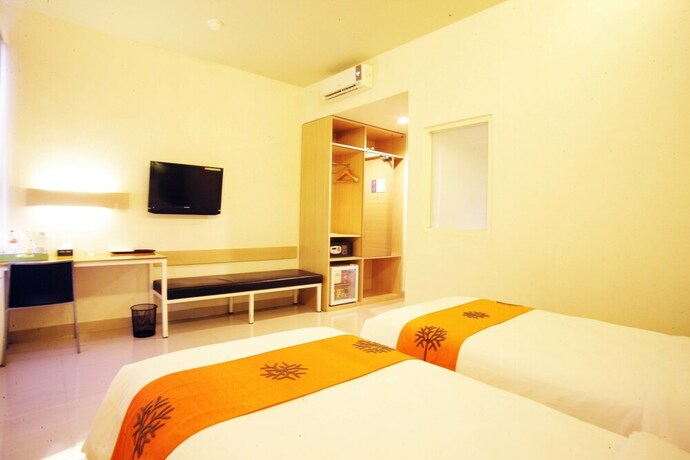 Imagen de la habitación del Hotel Avirahotel Panakkukang. Foto 9