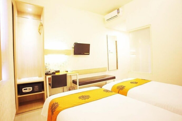 Imagen de la habitación del Hotel Avirahotel Panakkukang. Foto 10
