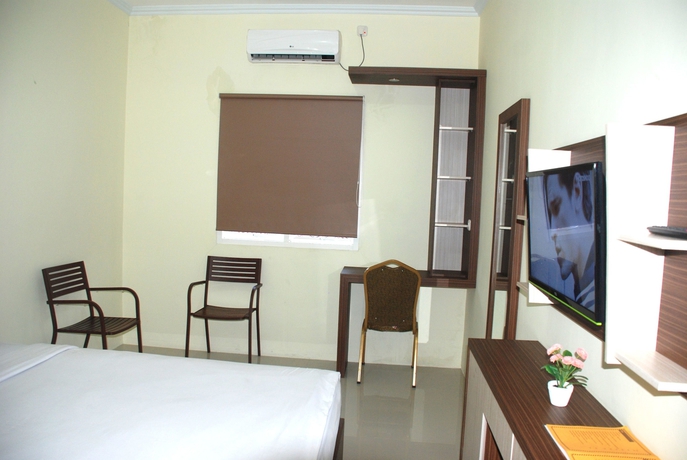 Imagen de la habitación del Hotel Avon's Residence. Foto 13