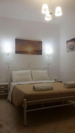 Imagen de la habitación del Hotel Avra Rooms. Foto 12