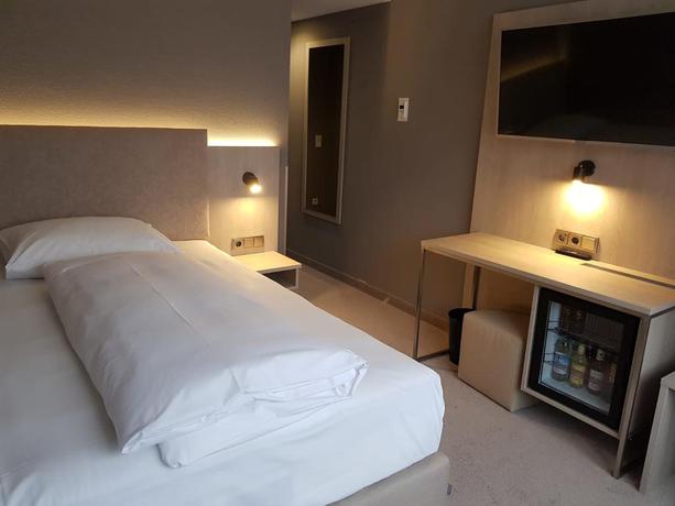 Imagen de la habitación del Hotel Awa, Munich. Foto 10