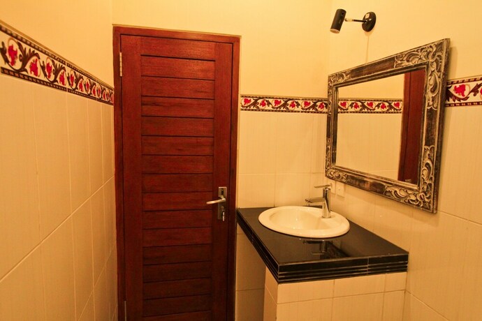 Imagen de la habitación del Hotel Awan Bali House. Foto 22