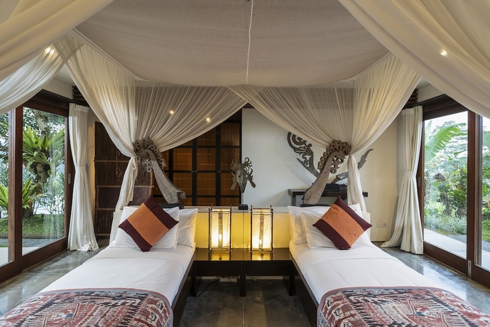 Imagen de la habitación del Hotel Awan Putih Resort. Foto 7