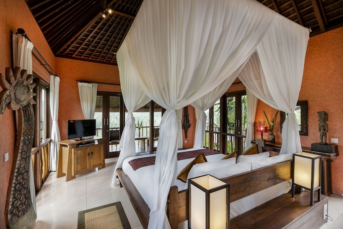 Imagen de la habitación del Hotel Awan Putih Resort. Foto 15