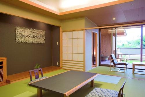 Imagen de la habitación del Hotel Awara Onsen Seifuso. Foto 7