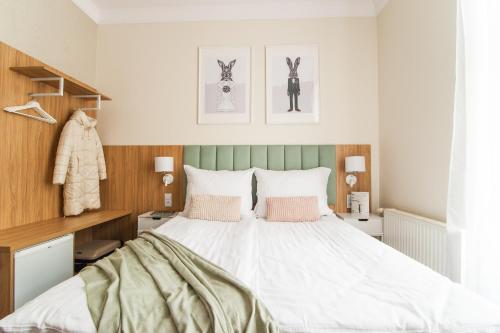 Imagen de la habitación del Hotel Awo. Foto 12