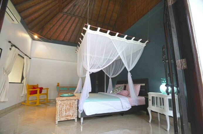 Imagen de la habitación del Hotel Axelle Villa. Foto 18