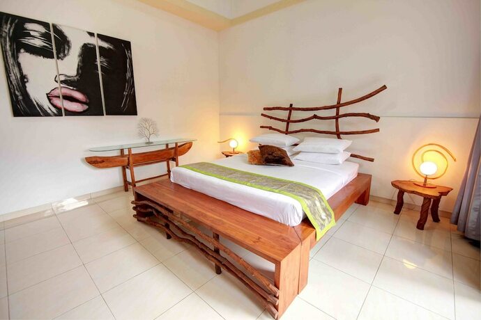 Imagen de la habitación del Hotel Axelle Villa. Foto 33