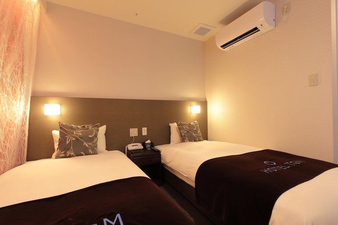 Imagen de la habitación del Hotel Axia Inn Osaka Uehonmachi. Foto 11