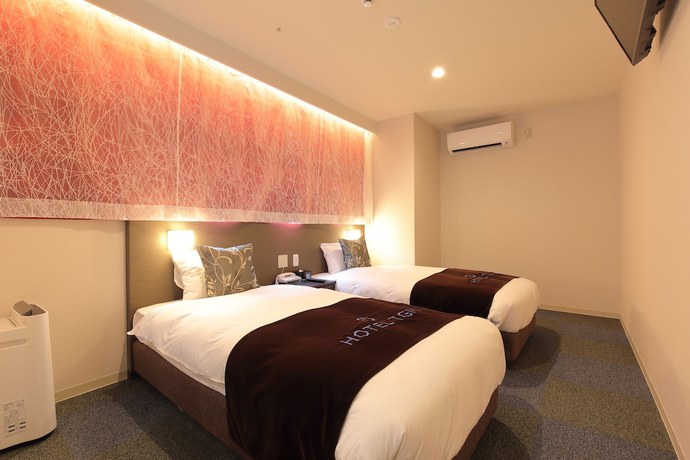 Imagen de la habitación del Hotel Axia Inn Osaka Uehonmachi. Foto 12