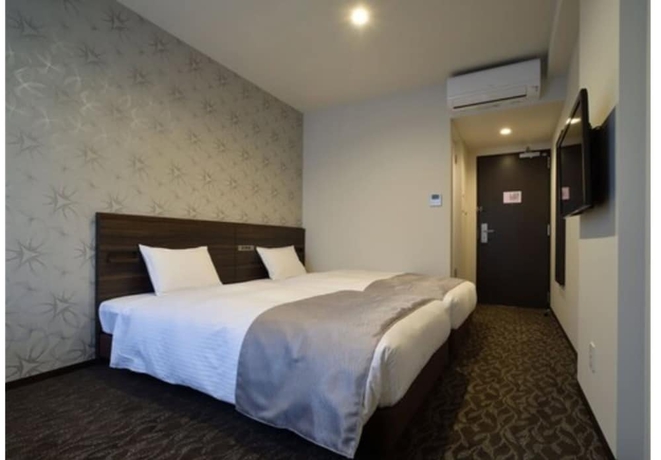 Imagen de la habitación del Hotel Axia Inn Sapporo Susukino. Foto 10