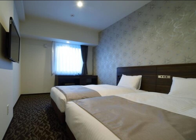 Imagen de la habitación del Hotel Axia Inn Sapporo Susukino. Foto 12