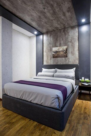 Imagen de la habitación del Hotel Axiaa Hotel. Foto 21
