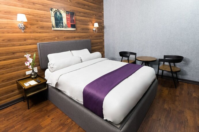 Imagen de la habitación del Hotel Axiaa Hotel. Foto 24