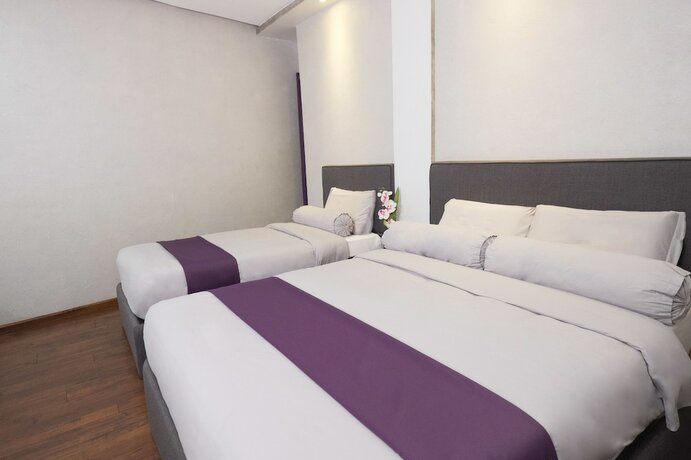 Imagen de la habitación del Hotel Axiaa Hotel. Foto 27