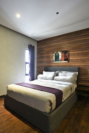 Imagen de la habitación del Hotel Axiaa Hotel. Foto 33